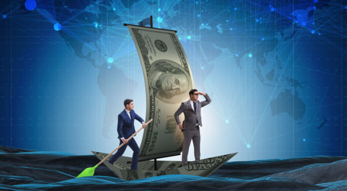 Business partnership with businessmen sailing on dollar boat
