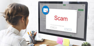 An employee reading phishing email