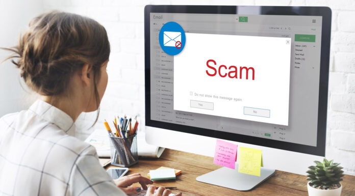 An employee reading phishing email