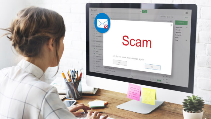An employee reading phishing email