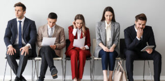 Young people waiting for job interview indoors
