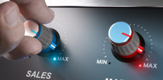 Profitable business concept, sales and margin improvement. Compositing between a hand and 3d background.