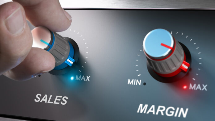 Profitable business concept, sales and margin improvement. Compositing between a hand and 3d background.