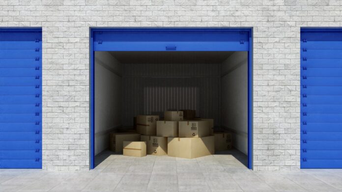 Open,Self,Storage,Unit,Full,Of,Cardboard,Boxes.,3d,Rendering